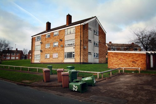 Front view of a skip on a street ready for hire